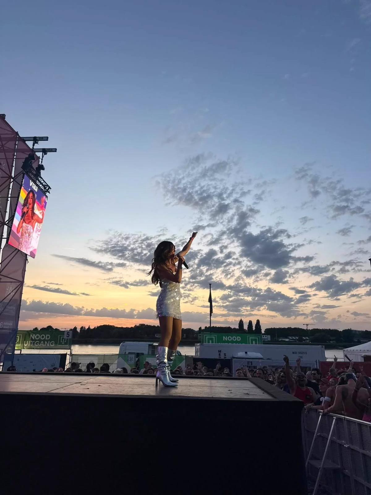 Katerine performing for the Antwerp Pride crowd at sunset